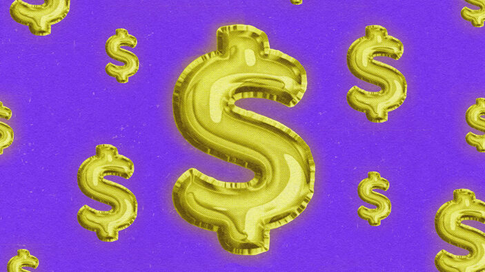 Shiny gold dollar signs on purple background